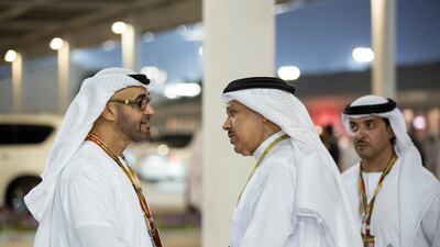 Sheikh Mohamed bin Zayed bids farewell to Dr Abdullatif Al Zayani, Secretary General of the Gulf Cooperation Council (R), after the 2014 Formula 1 Etihad Airways Abu Dhabi Grand Prix race at Yas Marina Circuit. Seen with Sheikh Hazza bin Zayed, , vice chairman of Abu Dhabi Executive Council. Ryan Carter / Crown Prince Court - Abu Dhabi