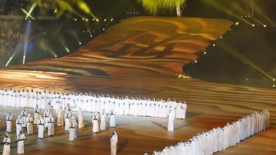A traditional dance is performed during celebrations at the Zayed Sports Stadium in Abu Dhabi. EPA /Ali Haider