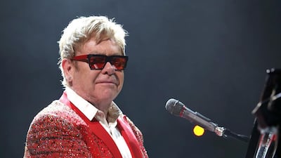 Elton John performs at Barclays Center in New York. The singer has postponed his Dubai concert for the second time. Greg Allen / Invision / AP