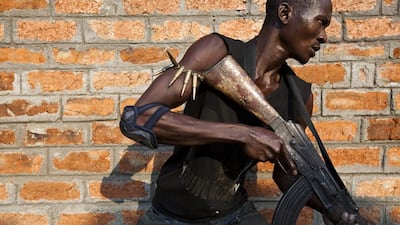 An anti-balaka militiamen, who was a former member of the Central African Armed Forces (FACA), takes part in a training session on the outskirts of Bangui. Ivan Lieman / AFP Photo