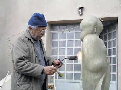 Adam Henein working on an Umm Kulthum sculpture, circa 2009. Karim Francis Gallery, Cairo