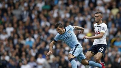 Sergio Aguero, left, scored for Manchester City against Tottenham Hotspur at White Hart Lane on Sunday. Adrian Dennis / AFP