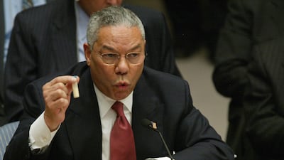 Colin Powell holds up a vial to illustrate Saddam Hussein’s alleged use of anthrax. AFP