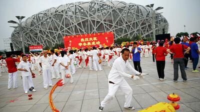 People celebrate after Beijing was chosen to host the 2022 Winter Olympics. Damir Sagolj / Reuters