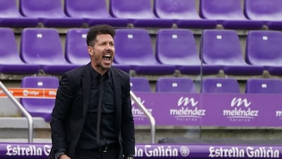 Atletico Madrid's coach Diego Simeone reacts during the match against Real Valladolid. AFP