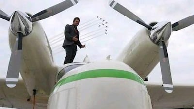 Joshua Hucklebridge, one of the Americans killed in a plane crash in Al Ain last year, poses with the rare seaplane at the London Air Show in 2010.