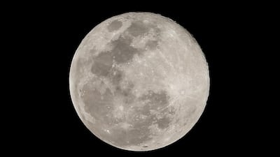 A close-up of the supermoon as it rises in the night sky over the Philippines' capital Manila. EPA