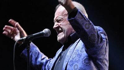 British blues and rock singer Joe Cocker performs on stage during a concert in his Hard Knocks world tour.