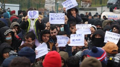 People demanding permission to get to EU during a rally on the territory of the transport and logistics center 'Bruzgi' near the the Bruzgi checkpoint at the Belarusian-Polish border, in the Grodno region, Belarus, 25 November 2021. Asylum-seekers, refugees and migrants from the Middle East arrived at the Belarusian-Polish checkpoint of Bruzgi-Kuznica aiming to cross the border. EPA