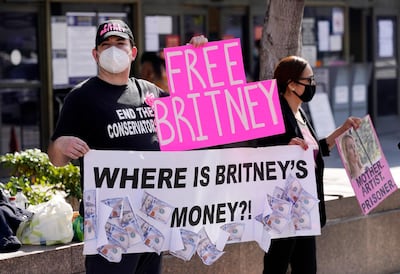 Britney Spears supporters Dustin Strand, left, and Kiki Norberto, protest outside of the Stanley Mosk Courthouse in Los Angeles, California on February 11. AP Photo
