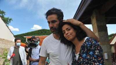 Leopoldo Luque, doctor and friend of Diego Maradona, and his wife Romina at their private home in Adrogue, Argentina. EPA