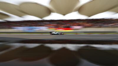 Nico Rosberg of Germany driving the (6) Mercedes AMG Petronas F1 Team Mercedes F1 WO7 Mercedes PU106C Hybrid turbo celebrates qualifying on pole position during qualifying for the Formula One Grand Prix of China at Shanghai International Circuit in Shanghai, China. Clive Mason / Getty Images