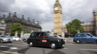 A black cab on the streets of Westminster, London. The maker of the famous taxi has opened a new British plant to build all-electric black cabs for the UK and global market. Oli Scarff / Getty Images