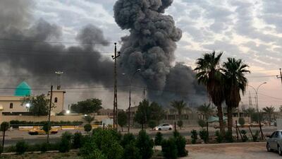 An explosion on August 12 at a Hashed Al Shaabi base southwest of Baghdad, Iraq. AP File