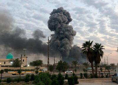An explosion on August 12 at a Hashed Al Shaabi base southwest of Baghdad, Iraq. AP File