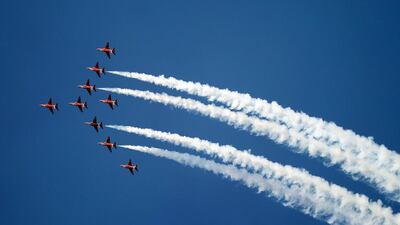 The Red Arrows, Britain’s Royal Air Force aerobatic team, on aerial manoeuvres at the Dubai Airshow. Karim Sahib / AFP