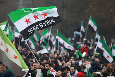 Celebrations sprung up on German streets after the fall of the former Syrian regime last year. EPA