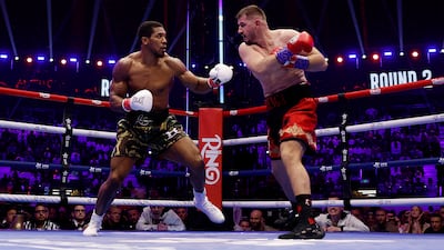 Anthony Joshua and Kristian Prenga in action at the Jeddah Superdome. Reuters