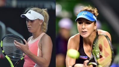 Denmark's Caroline Wozniacki, left, and Belinda Bencic of Switzerland will miss the French Open with injuries. Paul Crock and Yoshikazu Tsuno / AFP