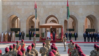 Sheikh Mohamed bin Zayed and King Abdullah stand for a National Anthem during a ceremony held to rename the Rapid Intervention Brigade as Sheikh Mohamed bin Zayed's Rapid Intervention Brigade, at Al Husseiniya Palace. Mohamed Al Hammadi / Ministry of Presidential Affairs
