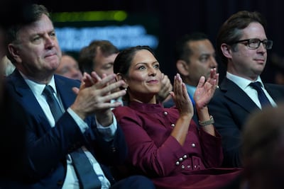 Priti Patel, centre, has been removed from the shadow cabinet. Getty Images