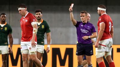 Canada's Josh Larsen, is set-off by referee Luke Pearce. PA