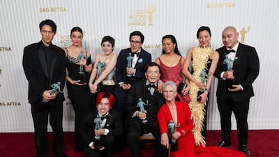 From left: Harry Shum Jr, Jenny Slate, Andy Le, Tallie Medel, Ke Huy Quan, James Hong, Stephanie Hsu, Jamie Lee Curtis, Michelle Yeoh and Brian Le, won best ensemble at the 29th Screen Actors Guild Awards. Reuters