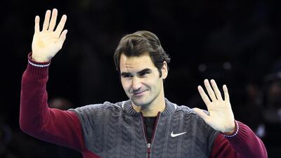 Roger Federer of Switzerland apologises to the crowd at the O2 Arena in London on Sunday, November 16, 2014. Reuters