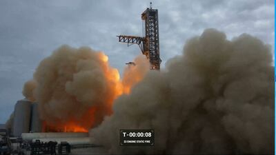 This frame grab from a video provided by SpaceX shows a test-firing on February 9, 2023 of the massive engines on the most powerful rocket ever built, designed to send astronauts to the Moon and beyond, at a SpoaceX base in Boca Chica, Texas. - The test, called a static fire, of the 33 Raptor engines on the first-stage booster of Starship took place at a SpaceX base in Texas. (Photo by Nicholas KAMM / SPACEX / AFP) / RESTRICTED TO EDITORIAL USE - MANDATORY CREDIT "AFP PHOTO / SPACEX" - NO MARKETING NO ADVERTISING CAMPAIGNS - DISTRIBUTED AS A SERVICE TO CLIENTS