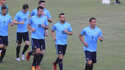 Tim Cahill, right, trains with his Australia teammates ahead of their World Cup play-off with Honduras. Gustavo Amador / EPA