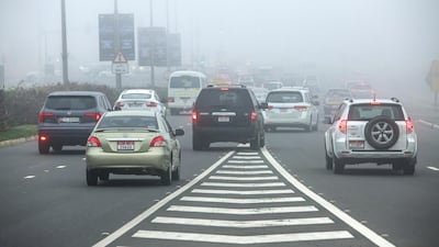 Morning fog hangs over Masdar bridge area in Abu Dhabi. Victor Besa / The National