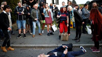 A fan takes a break while celebrating. REUTERS