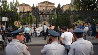 Armenian opposition supporters and relatives of servicemen wounded in the clashes with Azerbaijan's troops gather in front of Parliament in Yerevan to call for the resignation of Prime Minister Nikol Pashinyan. AFP
