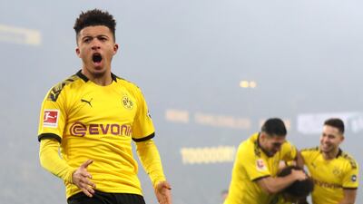 epa08218519 Dortmund's Jadon Sancho (L) celebrates after scoring the second. EPA