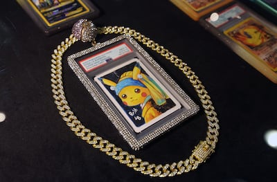 A 2023 Pokemon Old Maid Pikachu card featuring hand-painted artwork by Rosa La Barbera was among the standout collectibles at Playgrounds, presented in an elaborate stone-covered frame with a matching chain. Chris Whiteoak / The National