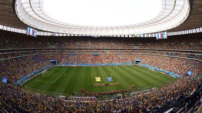 French and Nigeria players line up prior to their match on Monday at the 2014 World Cup round of 16 at the Estadio Nacional Mane Garrincha in Brasilia, Brazil. Evaristo Sa / AFP