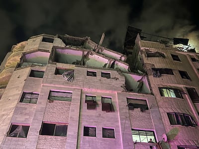 The upper floors of a residential building bear the scars of an Israeli strike on Gaza city. Reuters