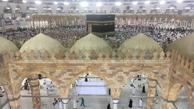 Hajj pigrims pray around the holy Kaaba at the Grand Mosque on the first day of Eid Al Adha in Makkah. EPA