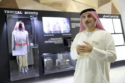 Abdulla Al Falasi, the Etihad Museum director, explaining the UAE Armed Forces Exhibition. (Pawan Singh / The National)