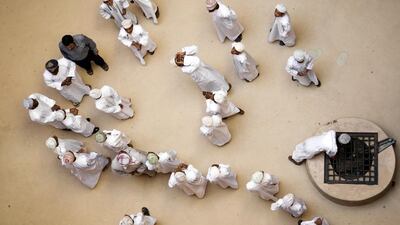 Omani social workers have called for regulation of private Quran tuition. Walter Bibikow / Getty Images