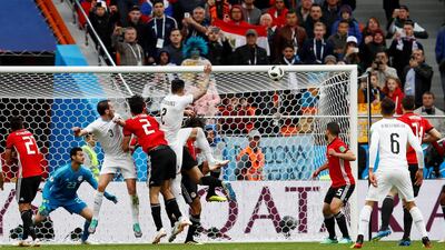 Match 2: Uruguay's Jose Gimenez scores against Egypt. Reuters