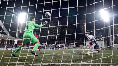 England's Tammy Abraham scores the third goal of the game. PA