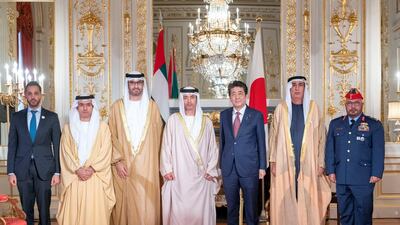 Sheikh Hazza bin Zayed stands for a photograph with Shinzo Abe. Seen with Maj Gen Ibrahim Al Alawi, Commander of the UAE Air Forces and Air Defence (R), Jaber Al Suwaidi, General Director of the Crown Prince Court - Abu Dhabi (2nd R), Dr Sultan Al Jaber, UAE Minister of State and Special Envoy to Japan, Hamad Al Shamsi Secretary General of the Supreme Petroleum Council (6th R) and Khalid Al Ameri, UAE ambassador to Japan (L). Rashed Al Mansoori / Ministry of Presidential Affairs