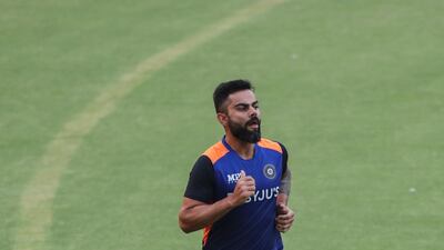 India's Virat Kohli goes for a jog during training. AP