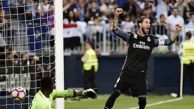 Real Madrid defender Sergio Ramos celebrates a goal by Real Madrid’s French forward Karim Benzema. Jose Jordan / AFP