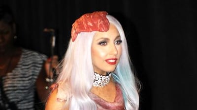 Lady Gaga wears her controversial meat dress, as she arrives in the Press Room after winning eight 2010 MTV Video Music Awards including Video of the Year at the Nokia Theater in Los Angeles on September 12, 2010. Mark Ralston / AFP photo