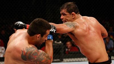 Antonio Rodrigo "Minotauro" Nogueira, right, punches Fabricio Werdum in their heavyweight fight during the UFC on FUEL TV event at Paulo Sarasate Arena on June 8, 2013 in Fortaleza, Ceara, Brazil. Nogueira will be visiting the UAE this week ahead of his April fight on Yas Island. Josh Hedges/Getty Images