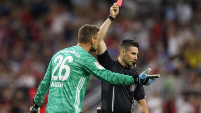 Bayern goalkeeper Sven Ulreich protests his red card. Reuters