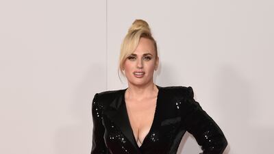 Rebel Wilson, wearing a black sequinned blazer dress, arrives at the Academy Museum of Motion Pictures Premiere Party in Los Angeles on September 29, 2021. AP Photo
