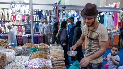 Wael Al Ahli sells nuts at the Eid Al Adha fair at the Fujairah Exhibition Centre. Victor Besa / The National